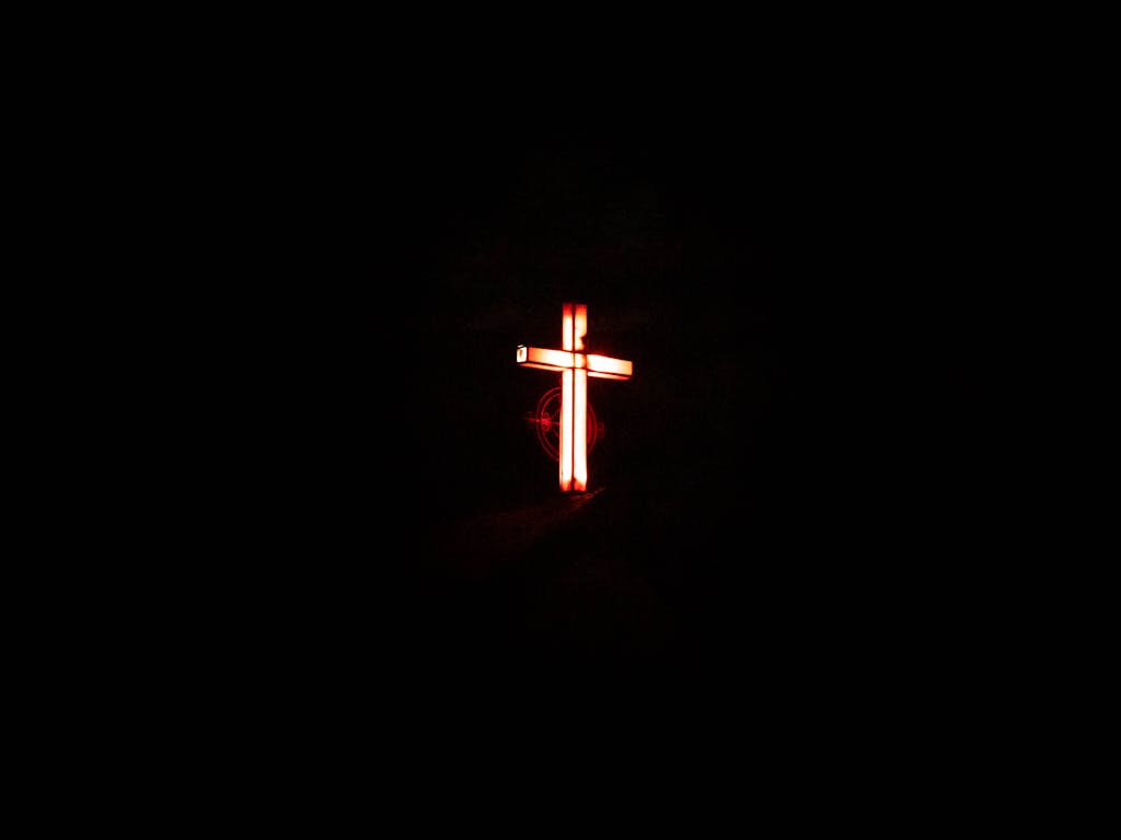 Glowing cross against a dark background from Faisalabad, Pakistan.